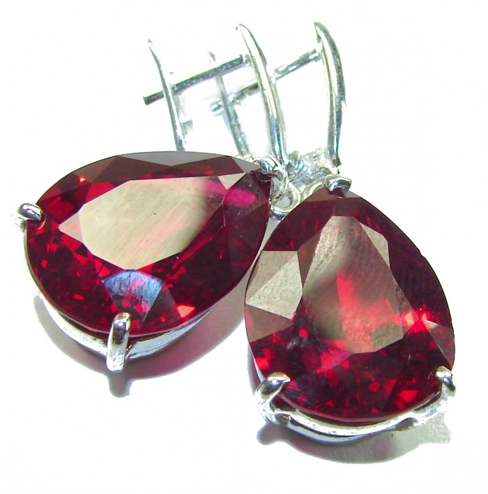 Blooming Rose pear cut 26.5 carat Red Topaz .925 Sterling Silver handmade Statement earrings - Close-up of Blooming Rose pear cut red topaz earrings in sterling silver.