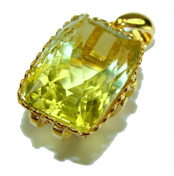 Baquette cut 10.3 carat Lemon Quartz 18K Gold over .925 Sterling Silver handcrafted pendant - Close-up of baguette cut lemon quartz pendant in gold setting.