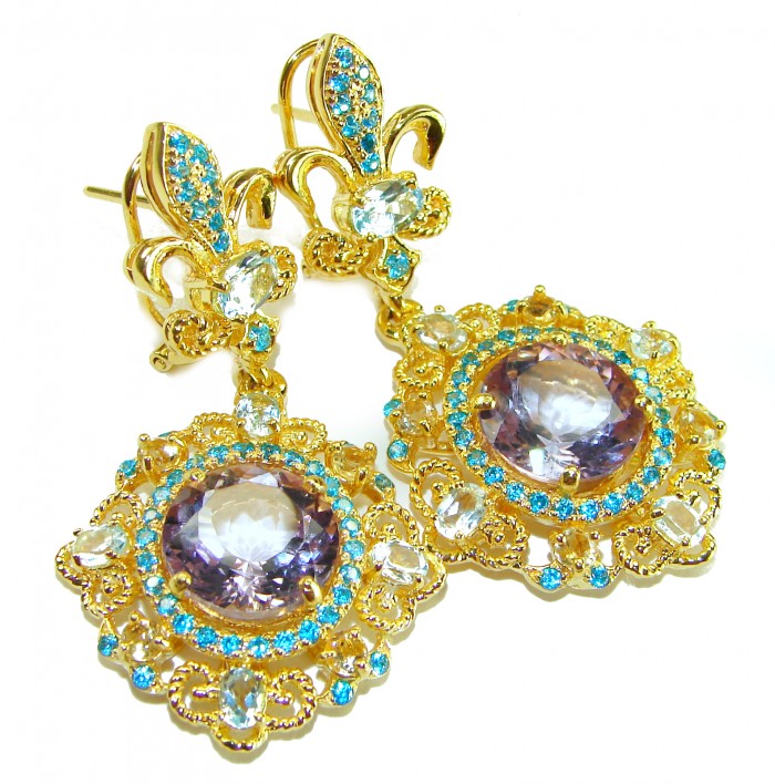 Celtic Spirit authentic fancy cut 22.5 carat Pink Amethyst 18K Gold over .925 Sterling Silver handcrafted Statement earrings - Close-up of ornate gold earrings with pink amethyst and blue accents.