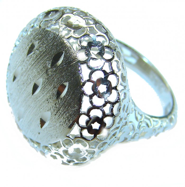 Casablanca Italy made .925 Sterling Silver brilliantly handcrafted ring s. 7 1/4 - Sterling silver ring with floral cutouts, angled side view.