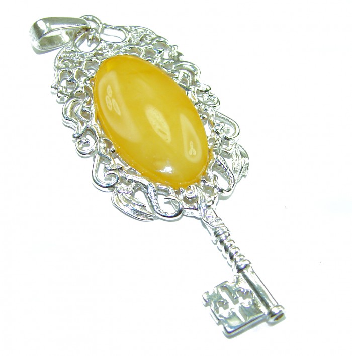 Golden Magic Key butterscotch Baltic Polish Amber .925 Sterling Silver handcrafted Pendant - Golden Magic Key with butterscotch amber, detailed side view.
