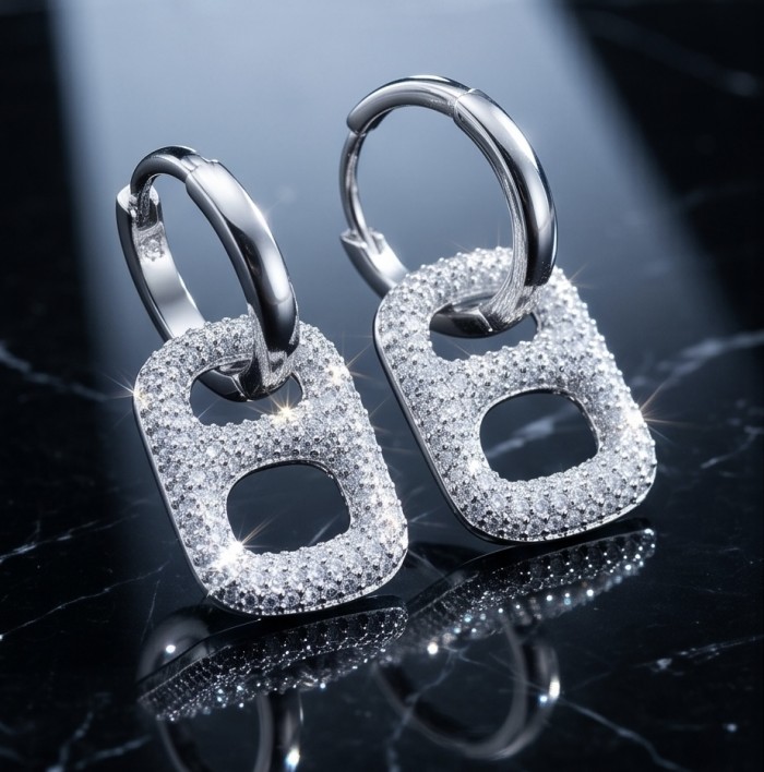 Precious Memories 2.5 carat pave White Topaz .925 Sterling Silver Handcrafted Statement earrings - Sparkling white topaz earrings close-up on a reflective surface