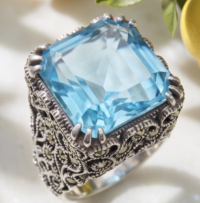 Poseidon 18.8 carat Swiss Blue Topaz .925 Sterling Silver dipped in rhodium handcrafted Large ring size 8 - Close-up of Swiss Blue Topaz ring in ornate sterling silver setting