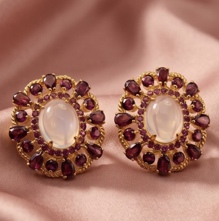 Ramona - Top quality 28.2 carat Brazilian Rose Quartz .925 Sterling Silver dipped in 18K Gold Handcrafted earrings - Oval earrings with rose quartz and garnet stones on pink fabric background