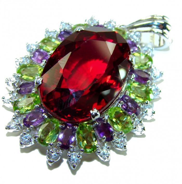 Victorian style 28.5 carat Authentic Ruby .925 Sterling Silver handcrafted Pendant - Close-up of 28.5 carat ruby pendant with colorful gemstone accents