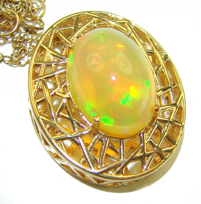 Earth Treasure Authentic 16.8 carat Golden Ethiopian Opal 22K Gold over .925 Sterling Silver handcrafted Statament Necklace - Close-up of 16.8 carat golden Ethiopian opal in intricate gold setting.