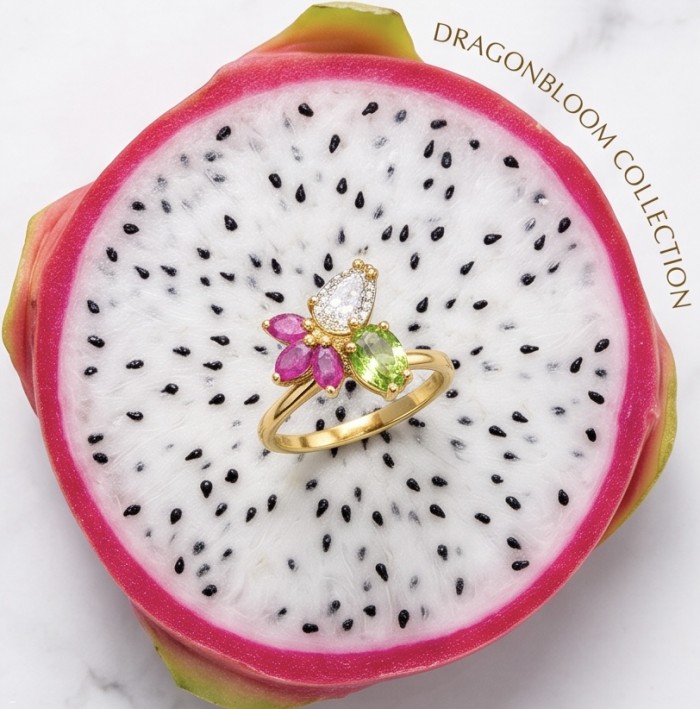 Juicy Gems 5.8 carat Multigem 18K Gold over .925 Sterling Silver Handcrafted Ring size 9 - Ring on dragon fruit, top view, showcasing multicolor gemstones.