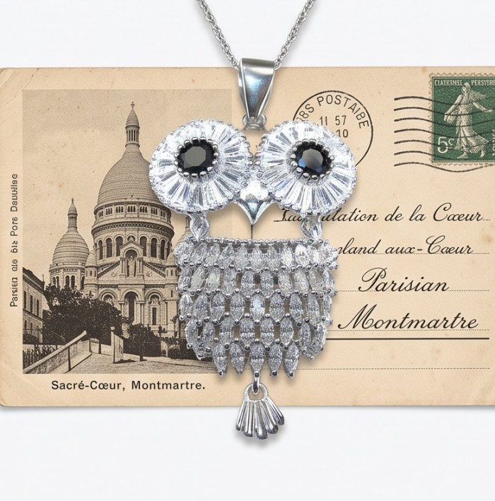 Precious Owl - 12.5 CARAT Sapphire .925 Sterling Silver handcrafted pendant - Front view of owl necklace with sapphire and sterling silver on postcard background