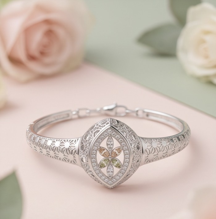 Casablanca - authentic 3.2 carat White topaz .925 Sterling Silver Bracelet - Ornate bracelet with floral design and topaz, side view.