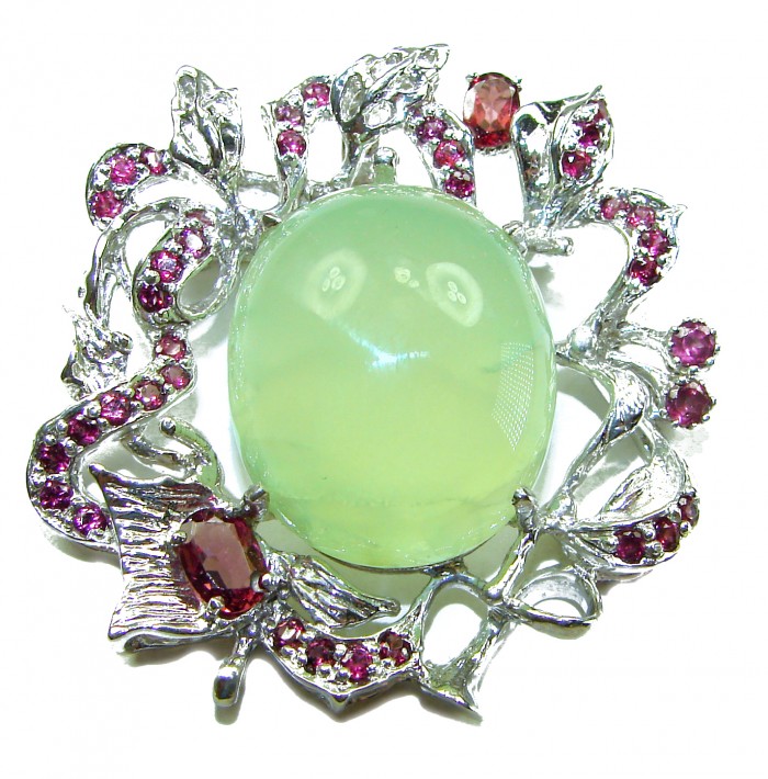 Royal quality genuine 32.5 carat Prehnite from South Africa rhodium over .925 Sterling Silver handcrafted Pendant Brooch - Close-up of a royal quality 32.5 carat Prehnite brooch ornament.