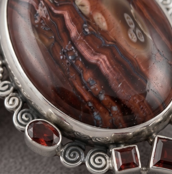 Incredible quality Silky Golden Tigers Eye .925 Sterling Silver handmade Pendant - Close-up of silky golden tiger's eye with ornate sterling silver setting
