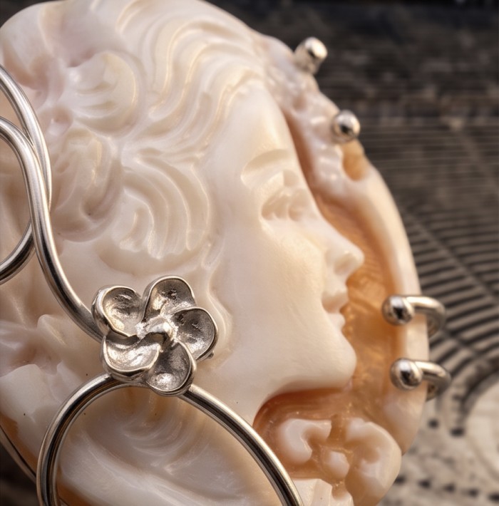 Exquisite oval Cameo real carved Ocean Shell .925 Sterling Silver handcrafted Made in Italy Statement ring; s. 7 ADJUSTABLE - Side view of cameo brooch with sterling silver floral detail.