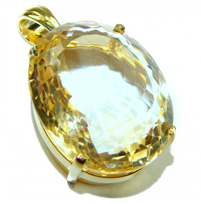 Perfection Oval cut 42.3 carat Lemon Quartz 18K Gold over .925 Sterling Silver handcrafted pendant - Close-up of oval-cut lemon quartz pendant in 18K gold setting.