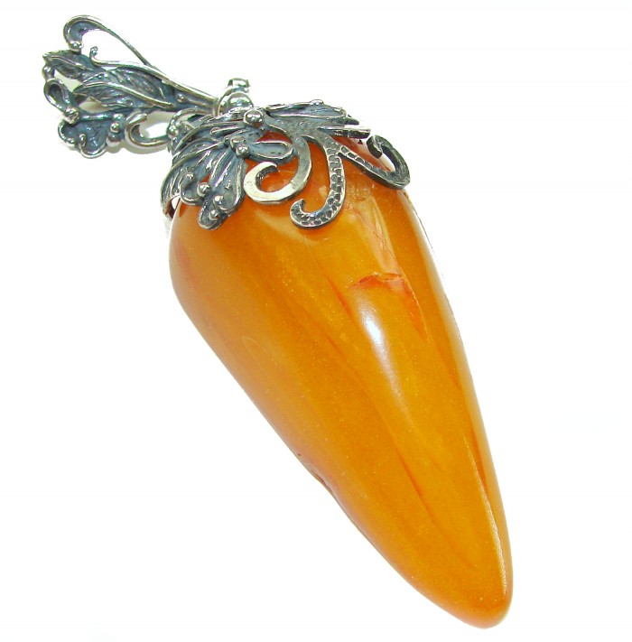 Large 3 3/4 inches Prehistoric Authentic Baltic Amber .925 Sterling Silver beautifully handcrafted Pendant - Side view of large prehistoric Baltic amber pendant with metal embellishment