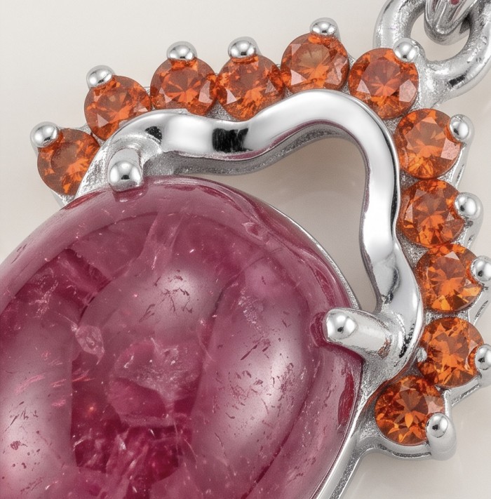 Authentic 6.5 CARAT Ruby .925 Sterling Silver Pendant - Close-up of ruby and orange gemstone sterling silver pendant.