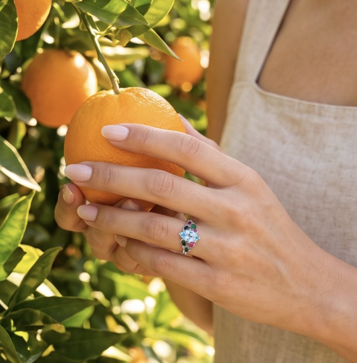 Pacifica 1.8 carat Swiss Blue Topaz .925 Sterling Silver handcrafted ring size 7 - Pacifica Swiss Blue Topaz ring worn on hand near orange trees.