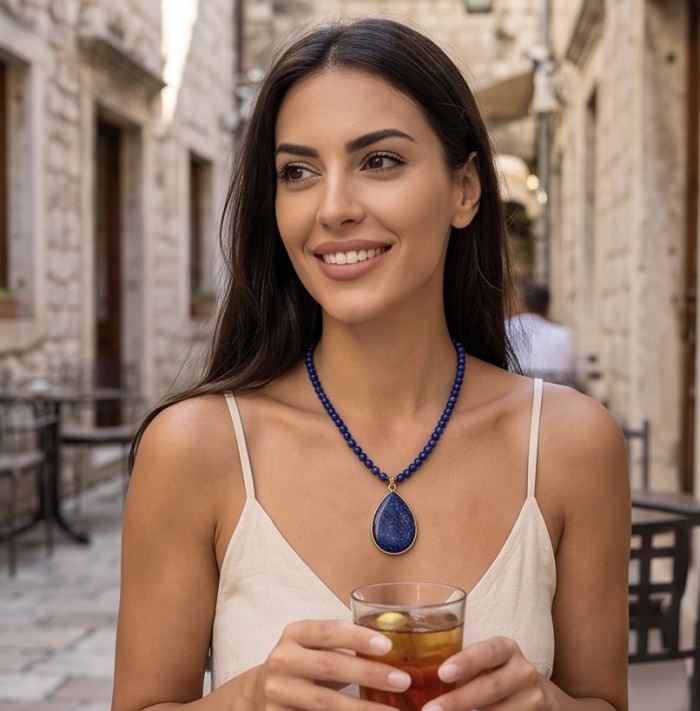 Bohemian style genuine Lapis Lazuli 14K Gold over .925 Sterling Silver Station Necklace - Woman wearing Bohemian Lapis Lazuli necklace, front view.