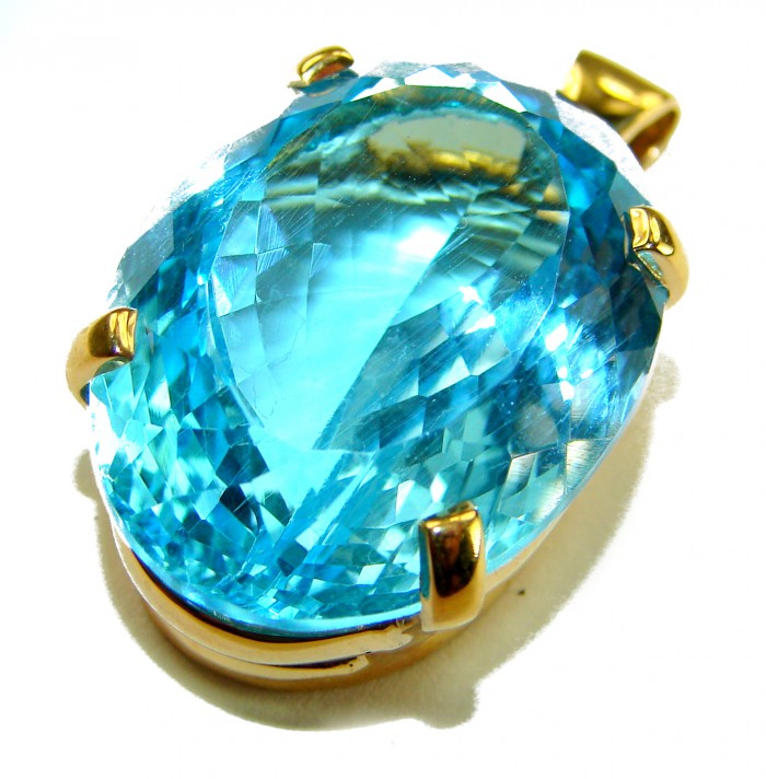 Atlantica oval cut 25.9 carat Swiss Blue Topaz 18K Gold over .925 Sterling Silver Handcrafted Pendant - Close-up of Atlantica 25.9ct Swiss Blue Topaz set in 18K gold.
