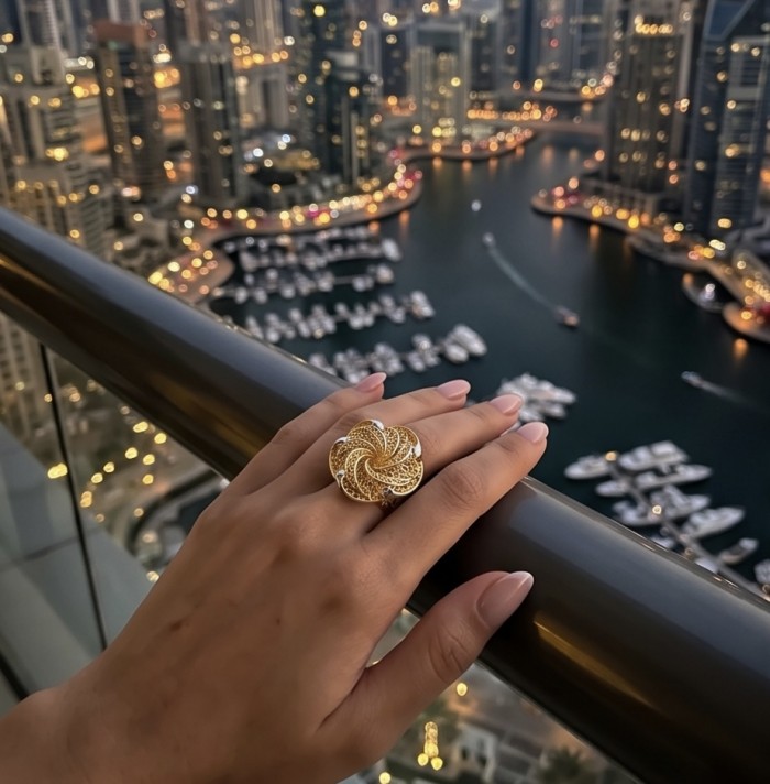 Dubai Style - .925 Sterling Silver dipped in 22K Gold handmade Large ring size 7 1/2 - Gold-plated floral ring worn on hand with city skyline in background.