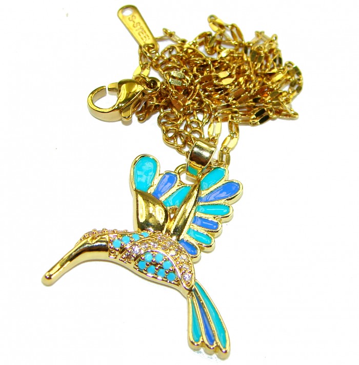 Exotic Bird- Vintage style- authentic inlay Turquoise .925 Sterling Silver handcrafted necklace - Close-up of turquoise bird pendant on a gold chain.