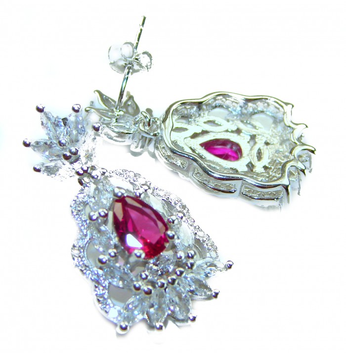 Magnificent Jewel 10.5 carat Ruby .925 Sterling Silver handcrafted incredible earrings - Close-up of ruby sterling silver earrings with intricate detailing
