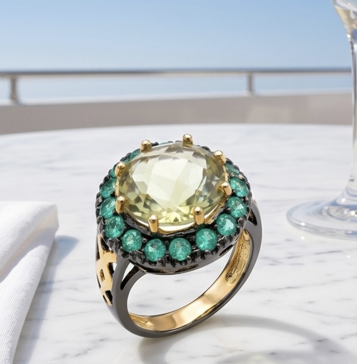 Tiffany - Natural 8.8 carat Brazilian Citrine .925 Sterling Silver dipped in black Rhodium 18K Gold handmade Statement Ring size 4 3/4 - Side view of citrine and emerald ring on marble table with ocean backdrop