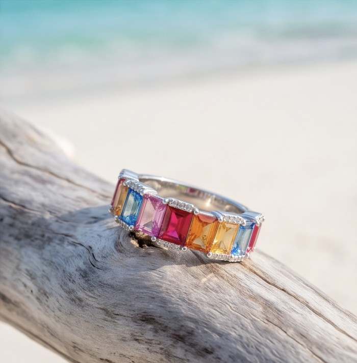 My own Rainbow - authentic 8.7 carat Topaz .925 Sterling Silver Ring size 6 - Side view of rainbow topaz ring on driftwood at the beach.