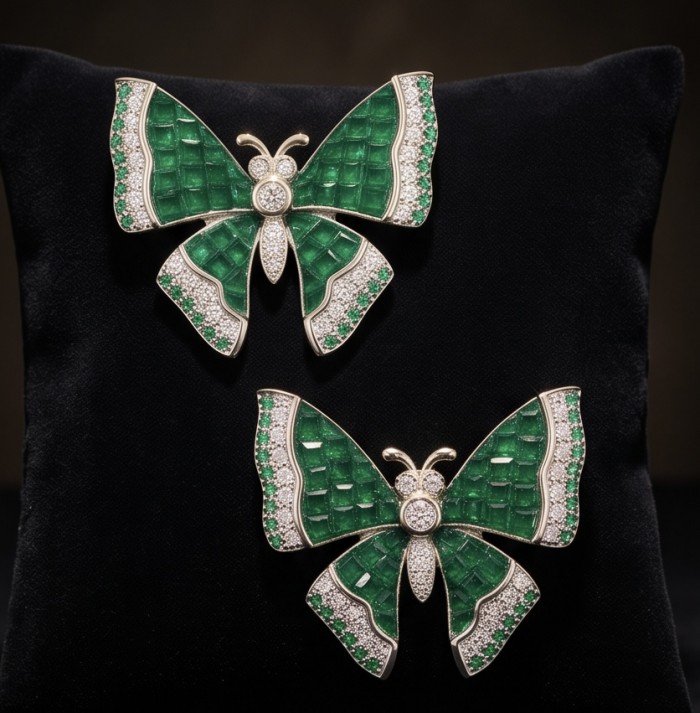 Incredible green Butterflies genuine mysery setting 11.5 CARAT Emerald .925 Sterling Silver handcrafted Earrings - Green butterfly brooches with gem setting, front view on black velvet