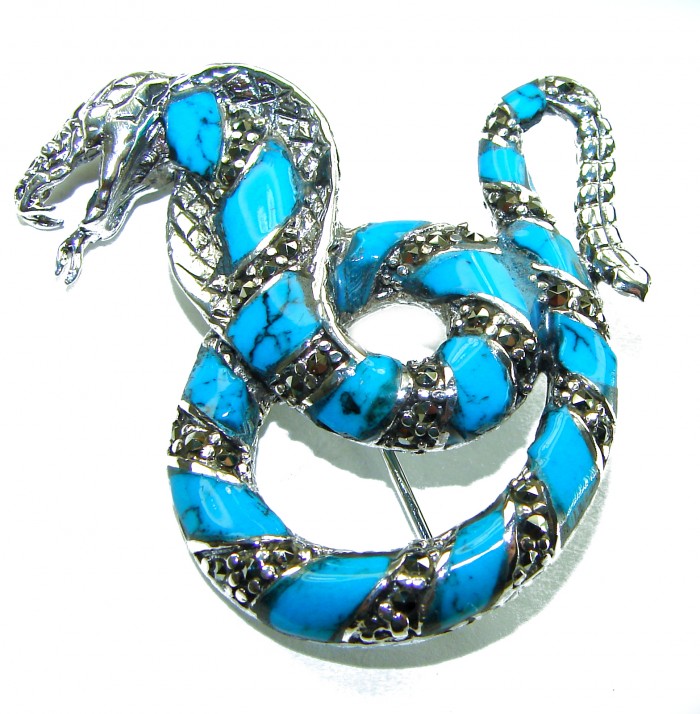 Cobra Snake inlay Turquoise .925 Sterling Silver handcrafted Brooch - Sterling silver cobra snake brooch with turquoise inlay, angled view.