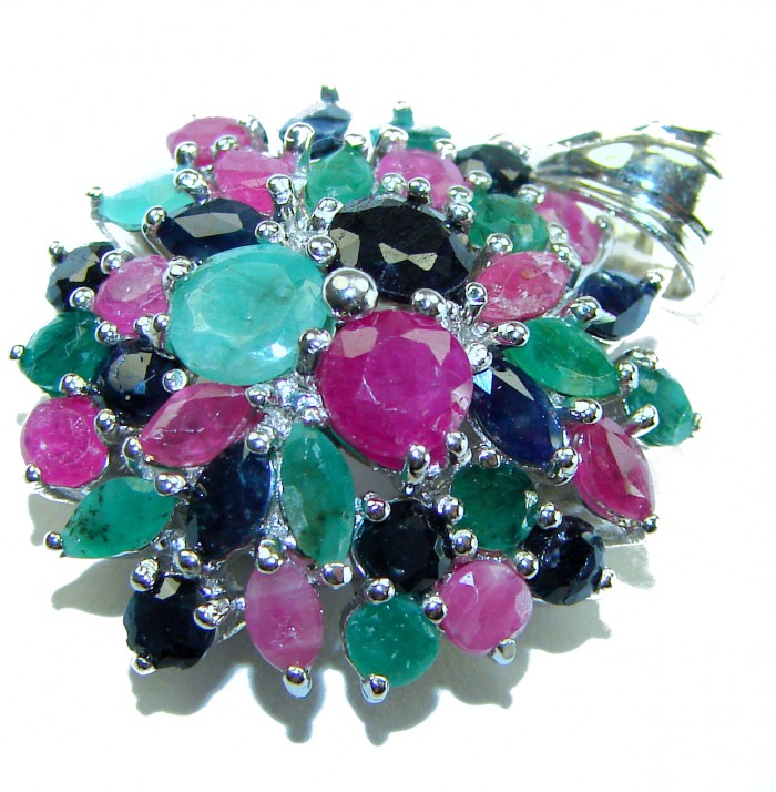 Circle of Life 15.2 carat authentic Sapphire Ruby Emerald .925 Sterling Silver handmade Pendant - Close-up of Circle of Life jewelry with sapphires, rubies, and emeralds.
