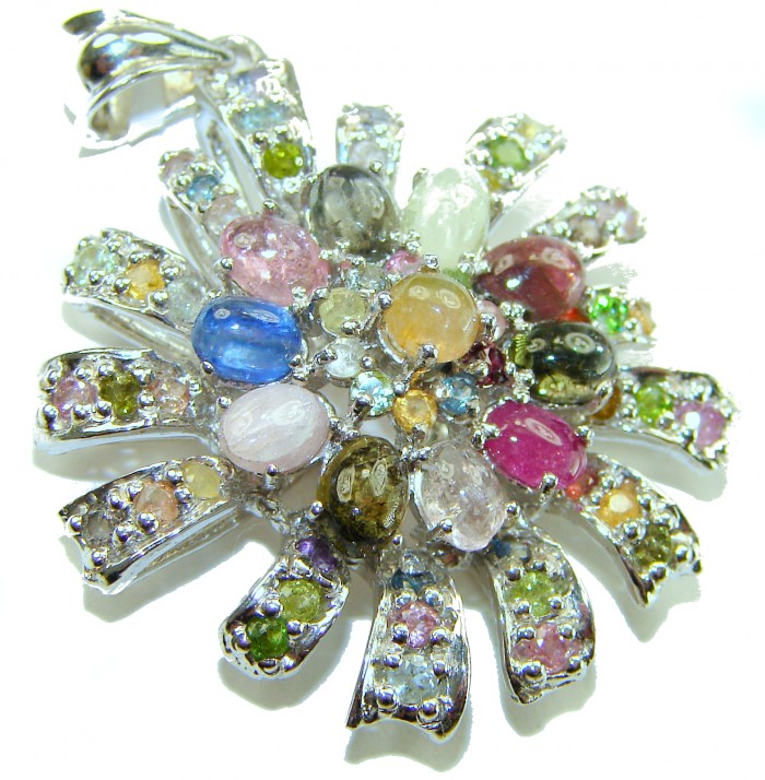 Brazilian Beauty 25.5ctw emerald cut Brazilian Tourmaline .925 Sterling Silver handmade Pendant - Close-up of multicolored Brazilian tourmaline pendant with silver.