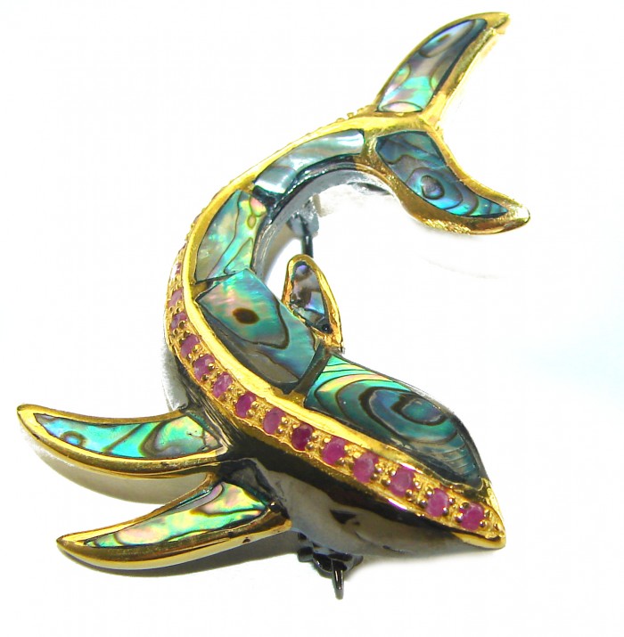 Dolphin Natural Rainbow Abalone Ruby 14K Gold over .925 Sterling Silver handmade Pendant Brooch - Side view of dolphin brooch with abalone and ruby accents on gold.
