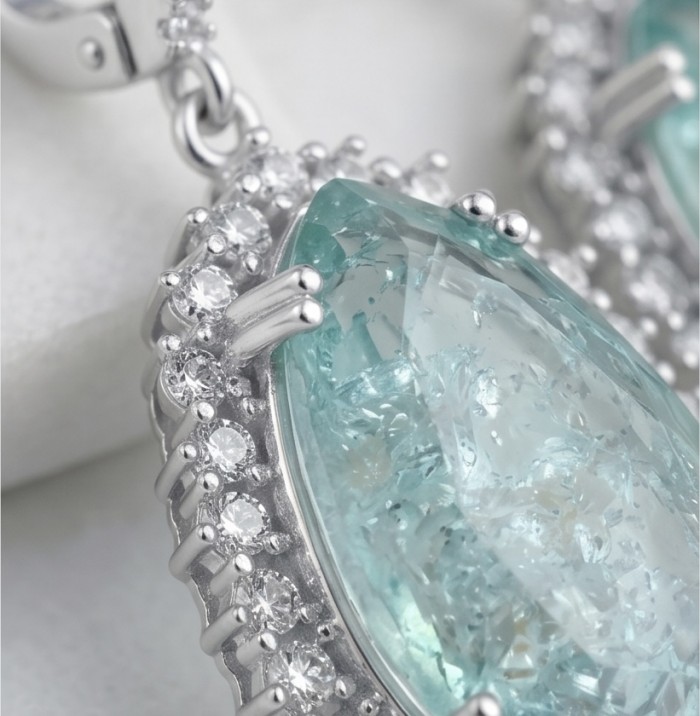 Angelina 20.9 carat authentic Aquamarine .925 Sterling Silver Handcrafted Earrings - Aquamarine stone close-up with diamond accents, Angelina 20.9 carat.