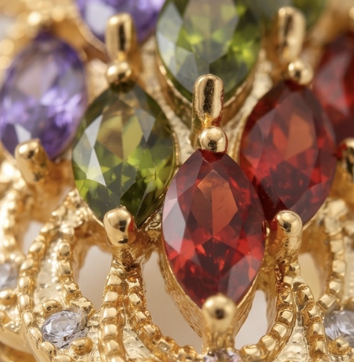Classy Beauty - authentic 8.7 carat multigem .925 Sterling Silver dipped in 14K Gold Eternity Ring size 6 - Close-up of multigem stones in gold setting, featuring red, green, and purple.