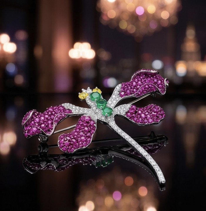 Precious Dragonfly 9.2 carat pave Mozambique Ruby rhodium over .925 Sterling Silver handcrafted Brooch - Dragonfly brooch with rubies and gems, side view against blurred lights.