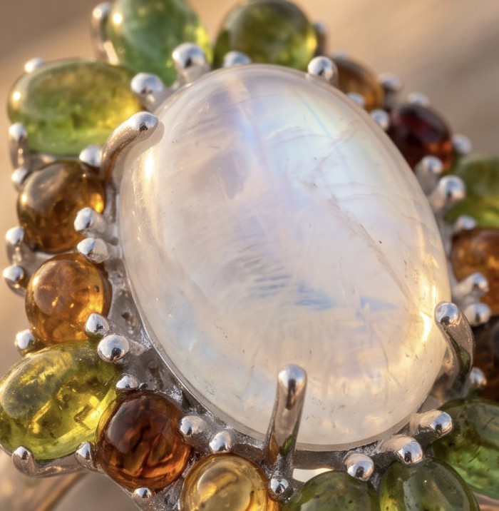 Angelina - Top quality 22.2 carat Brazilian Rose Quartz .925 Sterling Silver dipped in rhodium Handcrafted Ring size 6 - Close-up of a gemstone ring with orange and green accents