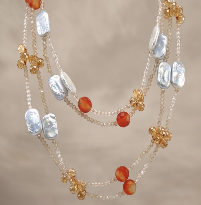 Giovanna - Top quality Natural Mother of Pearl .925 Sterling Silver handcrafted 38 inches necklace - Close-up of multi-strand necklace with pearls and orange stones.