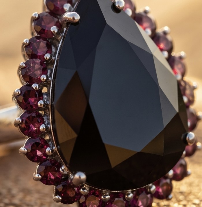 Roxanna - Huge 29.7 carat Black Onyx rhodium over .925 Sterling Silver handcrafted STATEMENT ring; s. 8 3/4 - Close-up of Roxanna black onyx ring with red gemstone accents