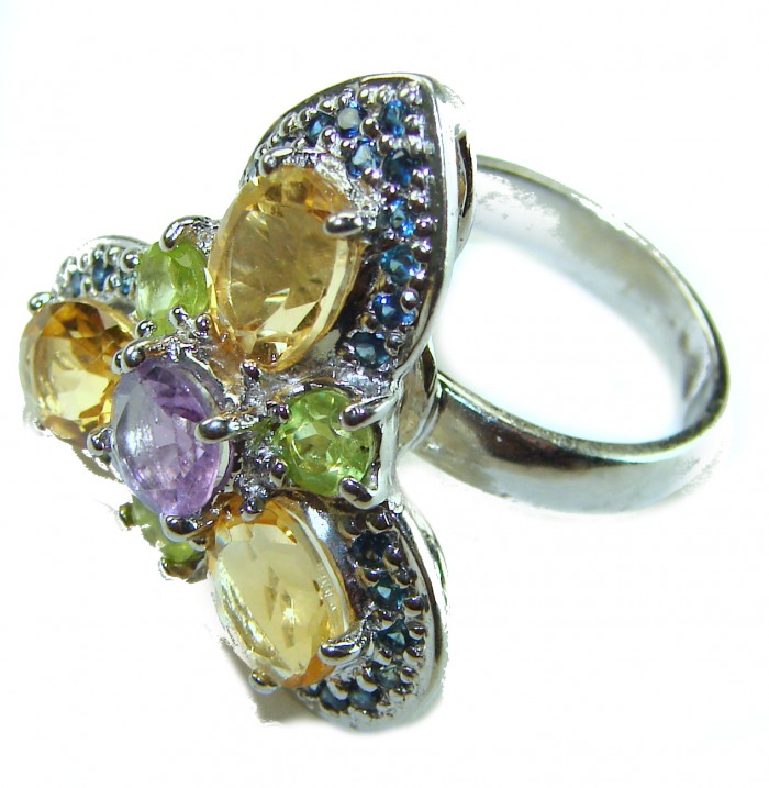 Golden Treasure 6.5 carat Citrine .925 Sterling Silver Handcrafted Ring size 7 - Close-up of multicolored gemstone ring in sterling silver setting.