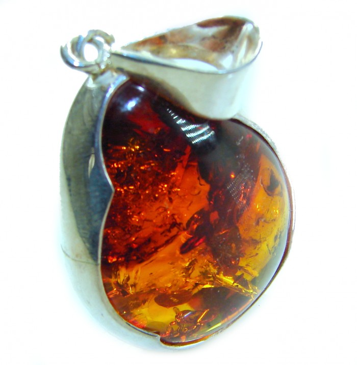 Prehistoric Authentic Baltic Amber .925 Sterling Silver beautifully handcrafted Pendant - Close-up of Baltic amber pendant in .925 sterling silver setting.