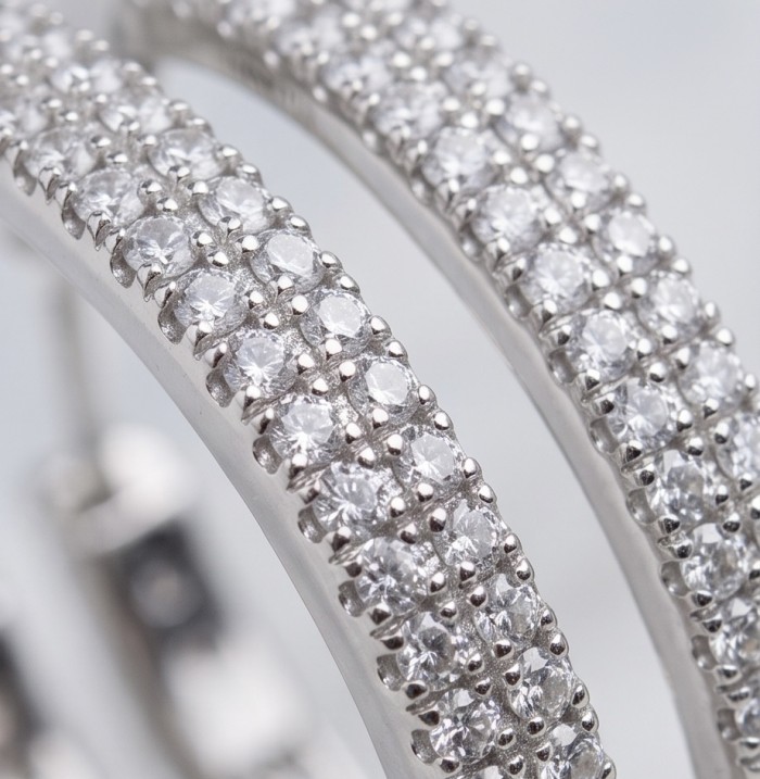 INSIDE - OUT Huge 1 3/8 inches long White Topaz rhodium over .925 Sterling Silver handmade Hoop Earrings - Close-up of white topaz earrings with rhodium overlay.