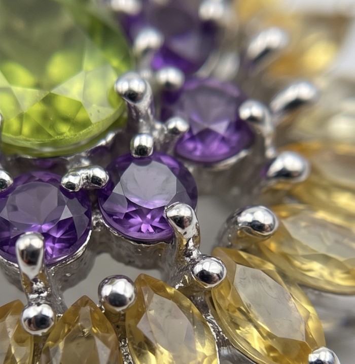 Isabel Authentic 11.2 carat Peridot from Arizona .925 Sterling Silver handmade pendant - Close-up of multicolored gemstone cluster in sterling silver setting
