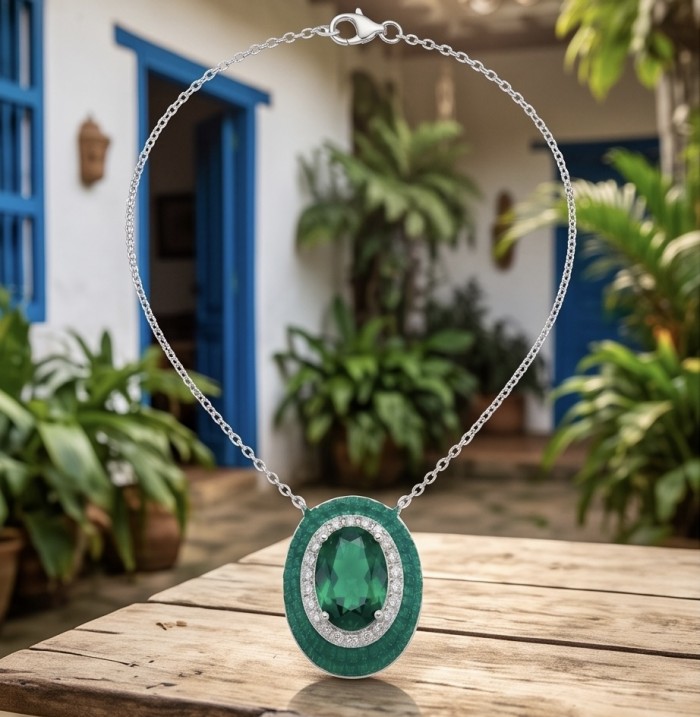 Art Deco - Royalty 10.2 carat Emerald .925 Sterling Silver .925 Sterling Silver Statement Necklace - Close-up of 10.2 carat emerald necklace on wooden table outdoors
