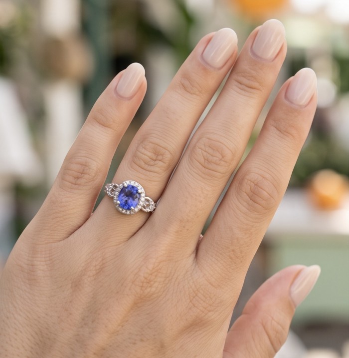 Born to Glam 5.2 carat natural Tanzanite .925 Sterling Silver Perfectly handcrafted Ring s. 5 - Tanzanite ring worn on hand, showcasing 5.2 carat stone with detail.