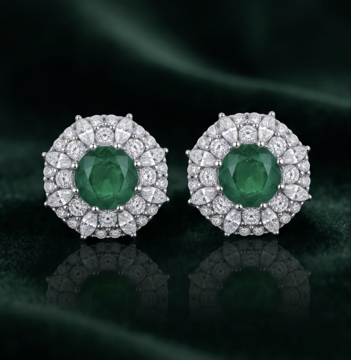 Spectaculat 4.5 carat Tsavorite Garnet rhodium over .925 Sterling Silver handcrafted earrings - Close-up of Tsavorite Garnet earrings with diamond accents on velvet.