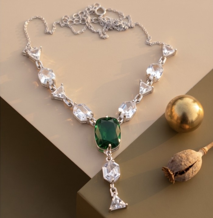 Giovanna - Authentic 7.5 CARAT natural Colombian Emerald .925 Sterling Silver handcrafted necklace - Necklace with green emerald centerpiece and clear stones, top view.