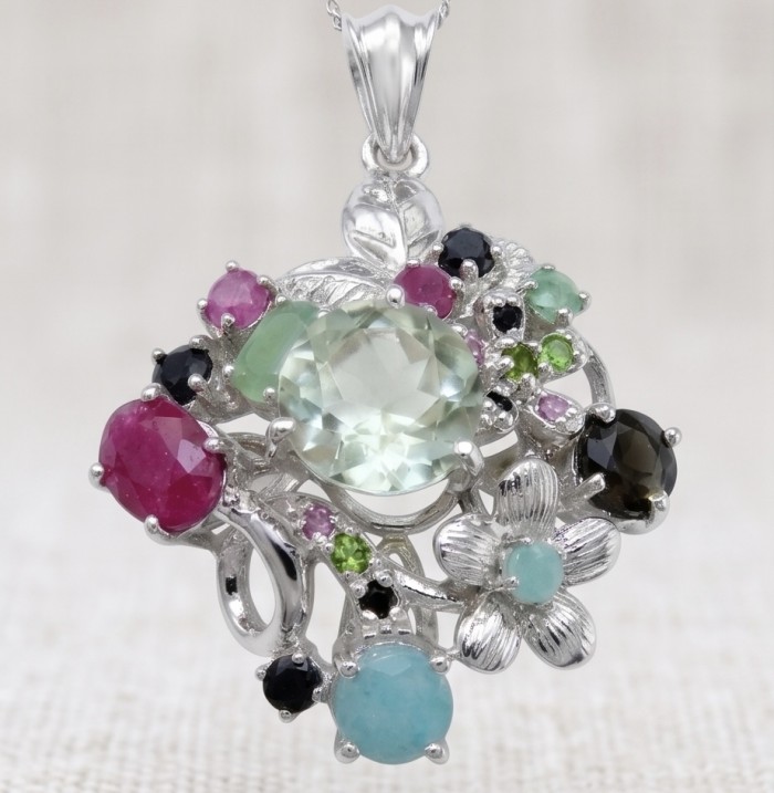 Isabel Authentic 20.2 carat Green Amethyst Sapphire rhodium over .925 Sterling Silver handmade pendant - Intricate gemstone pendant close-up showing colorful stones and floral design.