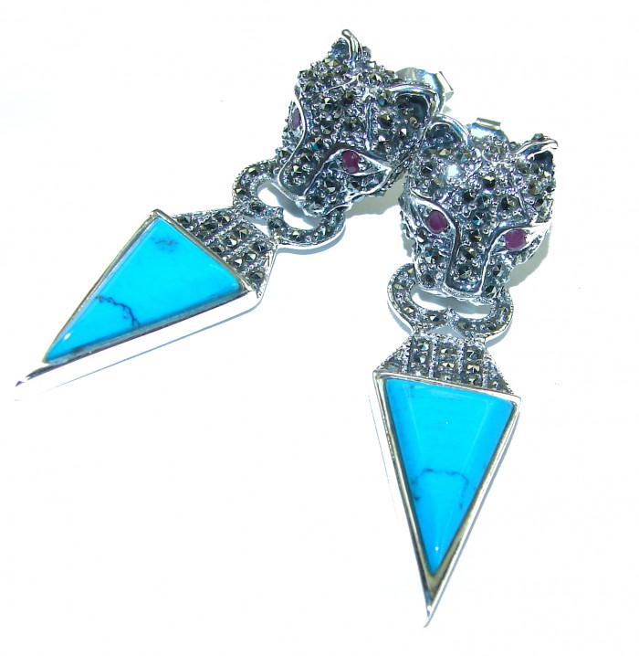 Spectacular Blue Cheetah inlay Turquoise .925 Sterling Silver handcrafted Earrings - Close-up of turquoise cheetah earrings with sterling silver detail.