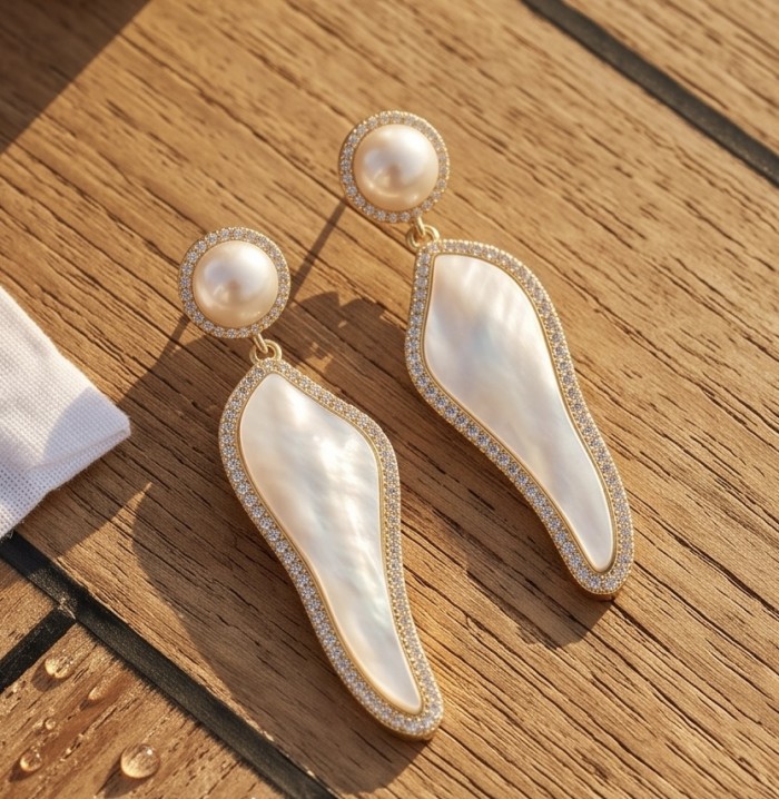Luxurious Genuine Blister Pearl 0.4 CARAT lab grown Diamond 18K Gold over .925 Sterling Silver handcrafted Statement Earrings - Luxurious blister pearl earrings, top view on wooden surface.