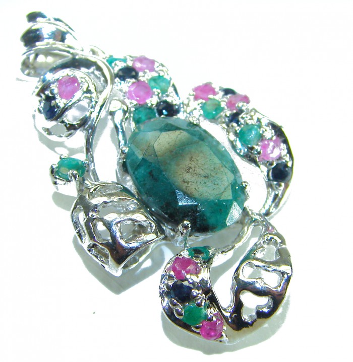 Perfect quality authentic 11.2 Grandidierite .925 Sterling Silver handmade Pendant - Close-up of Grandidierite pendant with colorful gemstones.